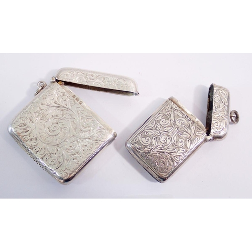 328 - Two silver vesta cases, Birmingham 1902 & Chester 1899, 70g, with engraved foliage decoration