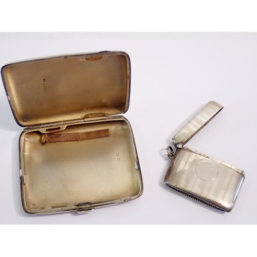 332 - A silver cigarette case, 86g and a silver vesta case, Birmingham 1946, 24g