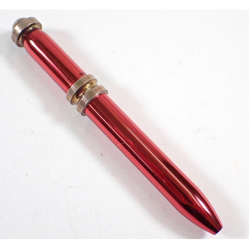 344A - A Tiffany silver gilt pen and a Tiffany Paloma Picasso red and sterling silver swivel pen, both with... 