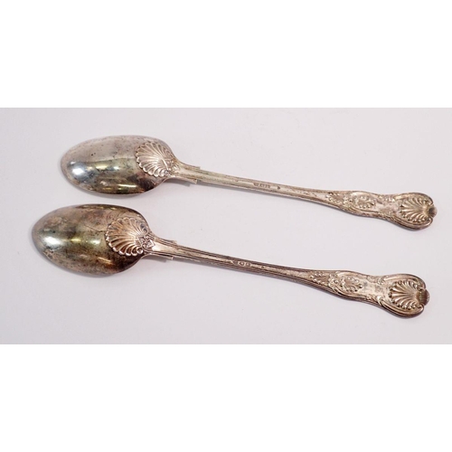 366 - A pair of Kings Pattern silver basting spoons with engraved crests, London 1892 by Francis Higgins, ... 