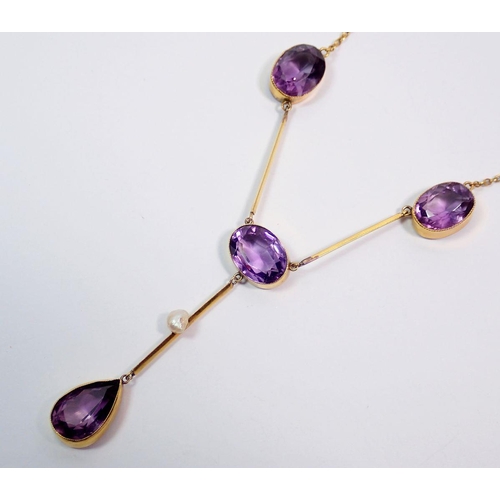 380A - An Edwardian 9 carat gold pendant necklace set four oval cut amethyst and pearl drops with similar a... 