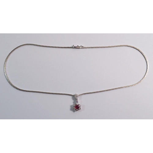 383 - An 18 carat white gold ruby and diamond floral cluster pendant necklace, diamond weight 0.62cts each... 