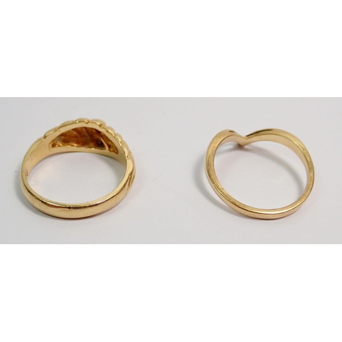 390 - A 14k gold wishbone ring and a 14k gold asymmetrical ribbed ring, size L 5.6g