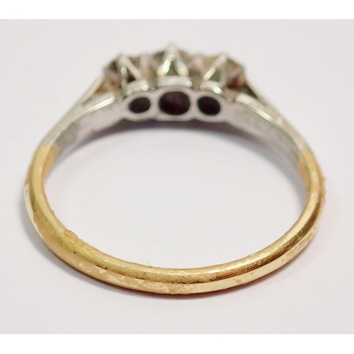 402 - An Edwardian 18 carat gold ring illusion set three chip diamonds, size I-J, 2g