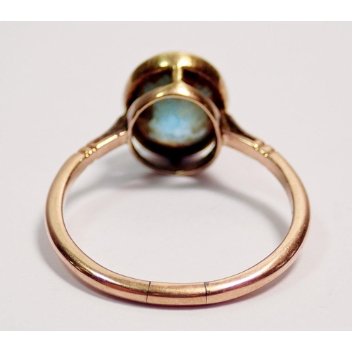 409 - A 9 carat gold ring set oval cut blue topaz, size Q, 2.8g