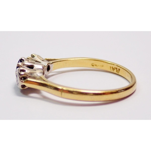 425 - An 18 carat gold and platinum sapphire and diamond ring, size P, 3.4g