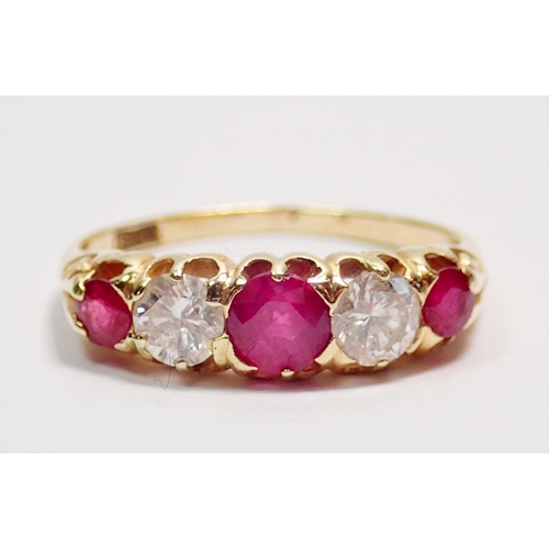 427 - A 15 carat gold ring set three rubies and two diamonds, size M, 2.2g