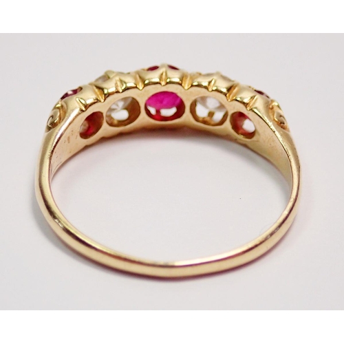 427 - A 15 carat gold ring set three rubies and two diamonds, size M, 2.2g