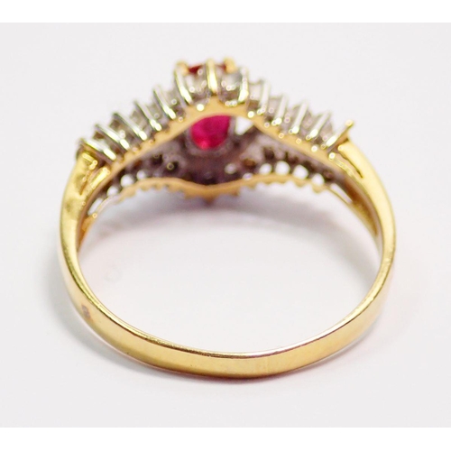 428 - An 18 carat gold ruby and diamond ring, size L, 2.8g