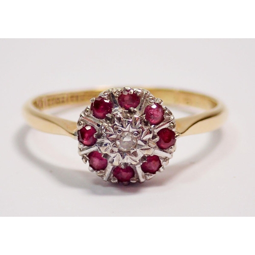 434 - An 18 carat gold diamond and ruby cluster ring, size O-P, 2.5g