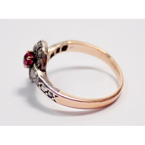 436 - An antique 18ct gold French ring set old cut diamonds wrapped around single ruby - with eagle mark, ... 