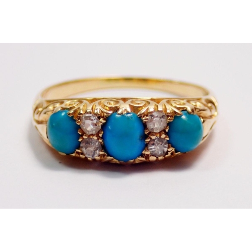 439 - An 18 carat gold ring set three turquoise and four diamonds, size M, 3.4g