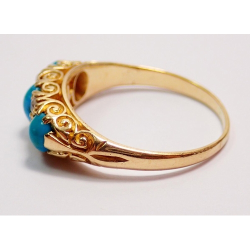 439 - An 18 carat gold ring set three turquoise and four diamonds, size M, 3.4g