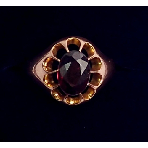 445 - A 9 carat rose gold ring claw set oval cut amethyst, size R, 4.8g