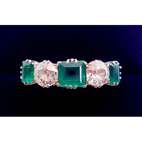 446 - A fine 18 ct gold ring set three emeralds and two diamonds, size O-P, the diamonds 5mm diameter, the... 