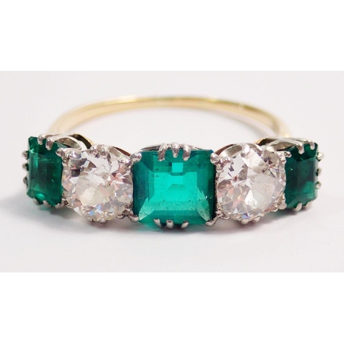 446 - A fine 18 ct gold ring set three emeralds and two diamonds, size O-P, the diamonds 5mm diameter, the... 