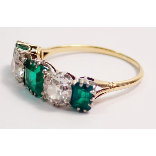 446 - A fine 18 ct gold ring set three emeralds and two diamonds, size O-P, the diamonds 5mm diameter, the... 