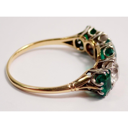 446 - A fine 18 ct gold ring set three emeralds and two diamonds, size O-P, the diamonds 5mm diameter, the... 