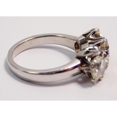 448 - A fine platinum three stone diamond ring, approx 3cts in total, size L to M, 7.4g