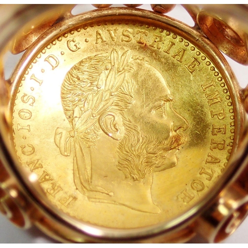 453 - An Austrian 10 franc coin 1915 mounted in 18 carat gold ring mount, size O, total weight 9g