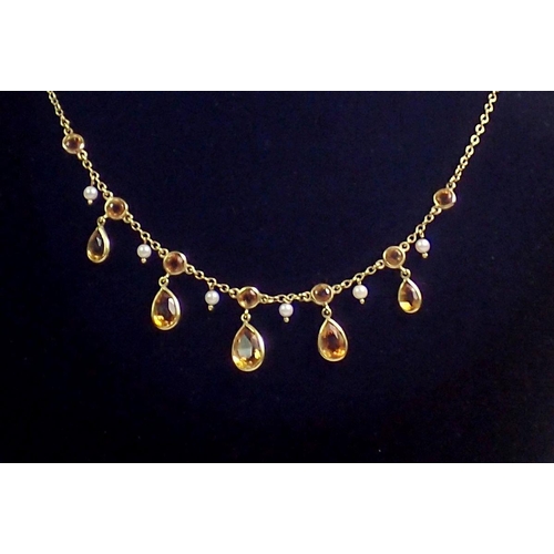 466 - A 9 carat gold necklace suspended citrines and pearls, citrines total weight 4.85 cts, total necklac... 