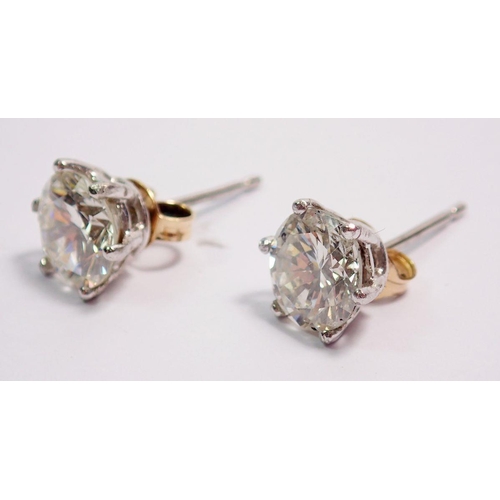 470 - A pair of large diamond stud earrings set in white gold, total diamond weight approx 2cts 70 points