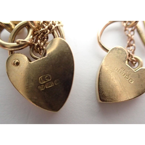 489 - Two 9 carat gold bracelets with heart padlocks, 1 catch a/f, 35.4g total