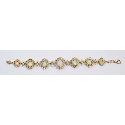 491 - A 9 carat gold opal bracelet, the seven graduated fancy scrollwork links each set an opal, 19.5cm, 2... 