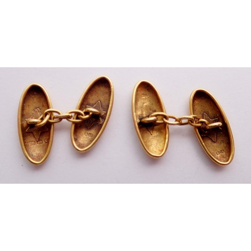 504 - A pair of 18 carat gold engraved cufflinks, 4.7g