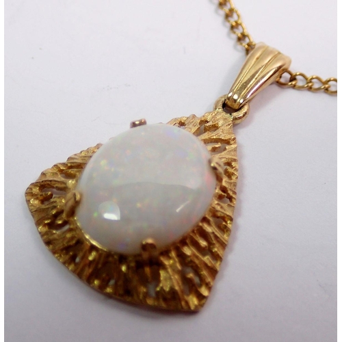 510 - A 9 carat gold opal set triangular pendant necklace on 9 carat gold chain, 2.8cm drop