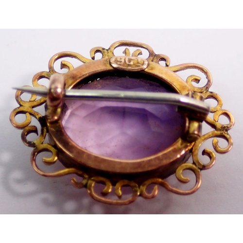 514 - A 9 carat gold filigree amethyst brooch, 2.2cm wide, 3.1g