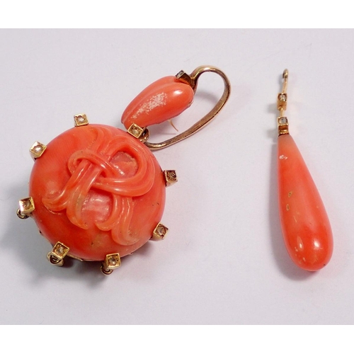 531 - A coral pendant engraved R in yellow metal mount, 4.5cm drop, plus a singe coral drop earring