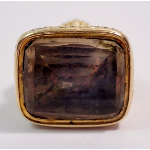 557 - A Victorian gilt metal seal set citrine, 2 x 1.8cm