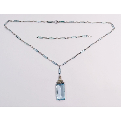 559 - A French Art Deco Platinon 'aquamarine' and crystal glass pendant necklace (extra chain), stone 3cm ... 