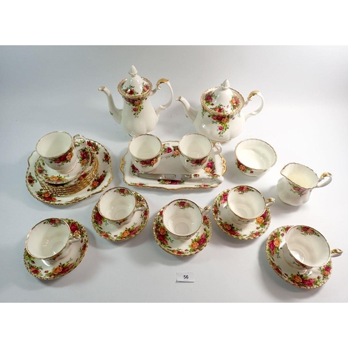 56 - A Royal Albert Country Roses part tea and coffee service comprising:- teapot, coffee pot, five tea c... 