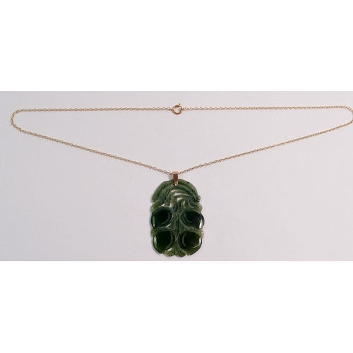 565 - A jade pendant necklace with 9 carat gold chain, 4.5 x 3cm, chain 45cm long, chain 1.9g