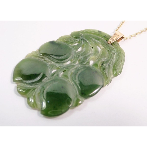 565 - A jade pendant necklace with 9 carat gold chain, 4.5 x 3cm, chain 45cm long, chain 1.9g