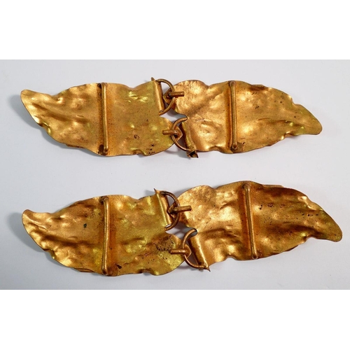 595 - Two Art Nouveau gilt metal leaf form buckles, 15cm wide