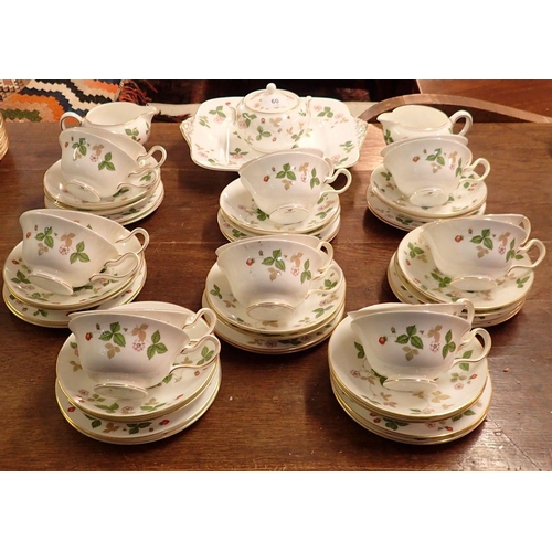 60 - A Wedgwood Wild Strawberry tea service comprising:- sixteen tea cups and saucers, sixteen tea plates... 