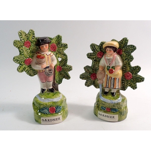 62 - Two Staffordshire reproduction flat back figures 'Gardner' gentleman and lady, 16.5cm tall