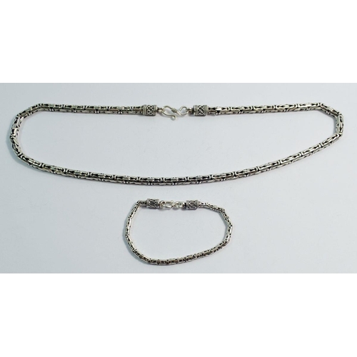 637 - A heavy silver fancy link bracelet and necklace, 82g, 18cm and 52cm long