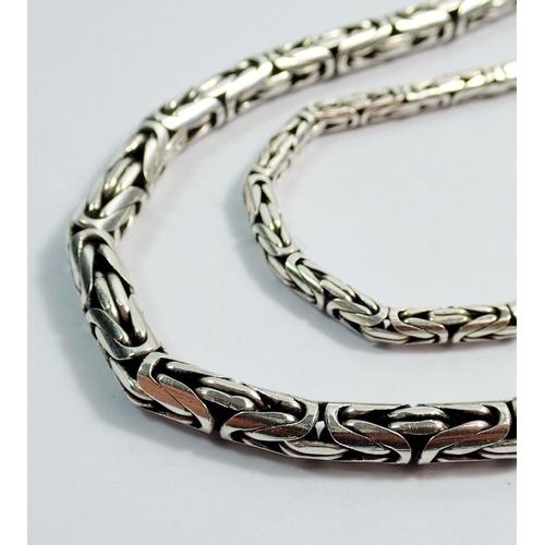 637 - A heavy silver fancy link bracelet and necklace, 82g, 18cm and 52cm long