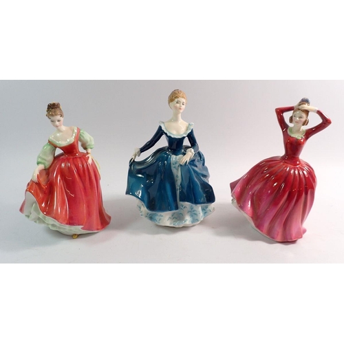 64 - Three Royal Doulton figures including Janine HN2461, Fair Lady (red) HN2832 and Katrina HN2327, 21cm... 