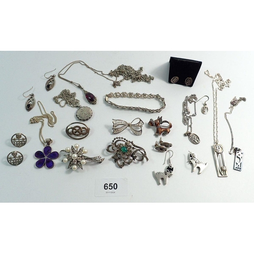 650 - A group of silver jewellery including brooches, earrings, bracelets, necklaces etc.