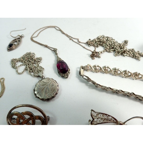 650 - A group of silver jewellery including brooches, earrings, bracelets, necklaces etc.