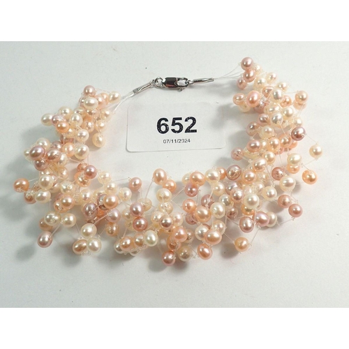 652 - A freshwater pink and white pearl elasticated collar necklace