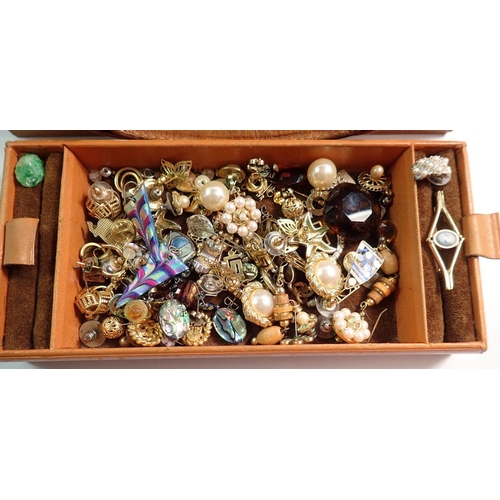 668 - A jewellery box containing various costume jewellery including earrings, brooches, watches etc.