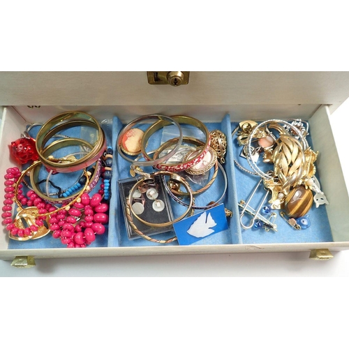 674 - A large collection of costume jewellery including necklaces, bracelets, brooches etc.