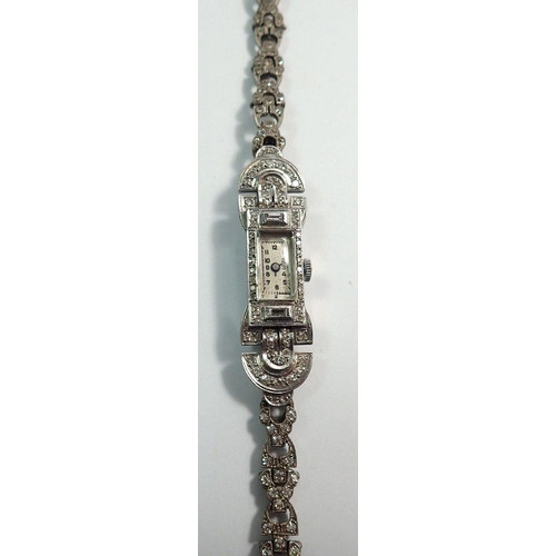 680 - A platinum Art Deco ladies wrist watch set diamonds (unmarked but tested), all on silver and paste s... 