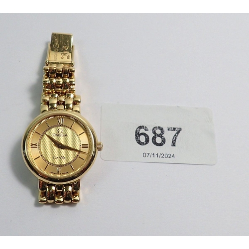 687 - An Omega ladies De Ville 18 carat gold wrist watch and strap, 42g total weight